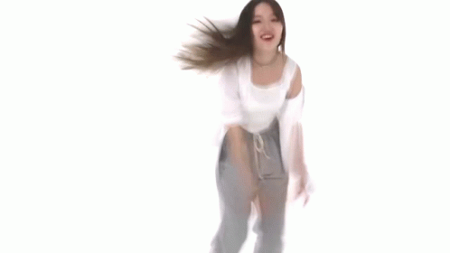 Woman Dancing In White Top And Gray Pants GIF