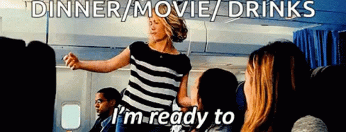 Woman Dancing On Airplane With Dinner Movie Drinks GIF