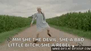 Woman Dancing on Dirt Road