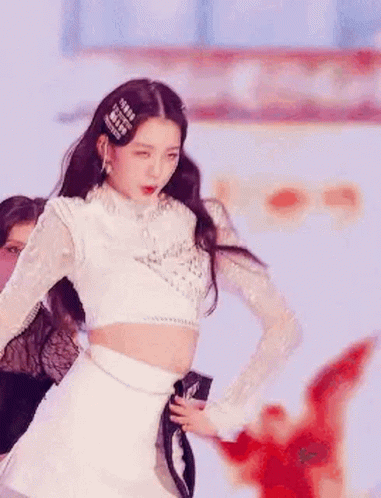 Woman Dancing on Stage in White Crop Top and Skirt