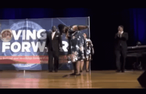 Woman Dancing on Stage Saying Moving Forward