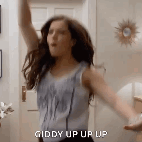 Woman Dancing with Arms Up Giddy Up Up