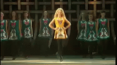 Woman Doing Irish Jig With Backup Dancers GIF