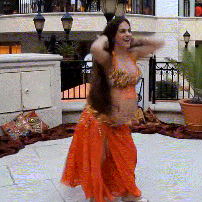 Woman Doing Pregnant Belly Dancing GIF