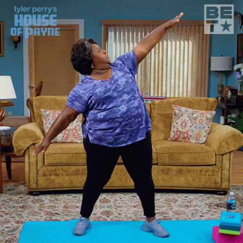 Woman Doing Yoga On Blue Mat GIF