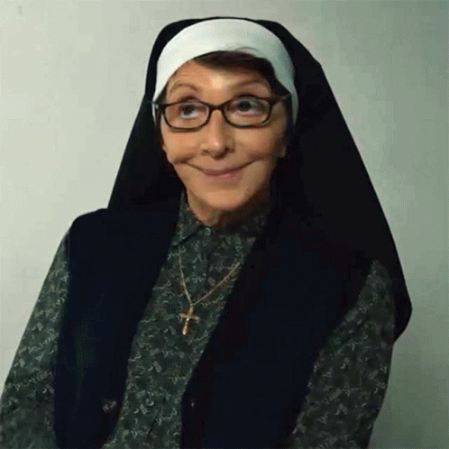Woman Dressed as Nun with Glasses and Cross