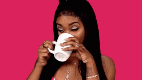 Woman Drinking Coffee from White Mug