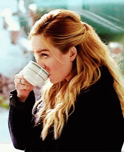 Woman Drinking Coffee With Green And White Stripe GIF