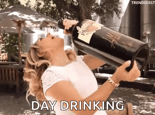 Woman Drinking From Bottle Of Plump Wine GIF
