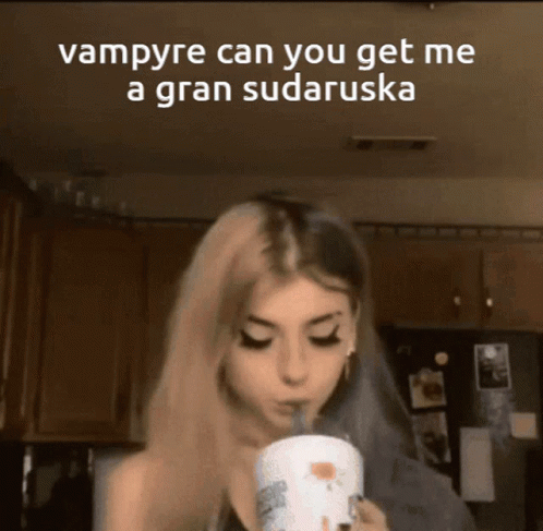 Woman Drinking From Cup Saying Vampire Can You Get Me a Gran Sudaruska