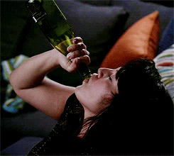 Woman Drinking From Jameson Bottle