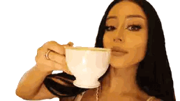 Woman Drinking From White Cup