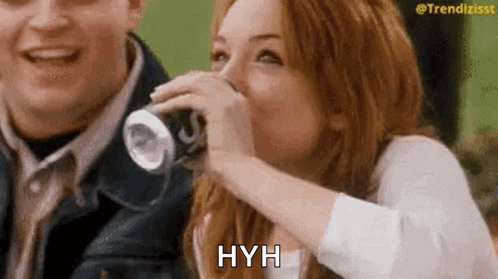 Woman Drinking Soda from Can
