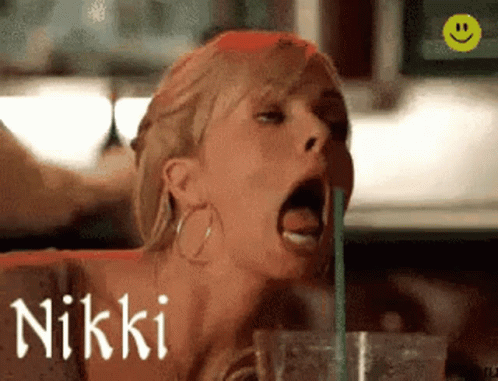 Woman Drinking Through Straw Nikki