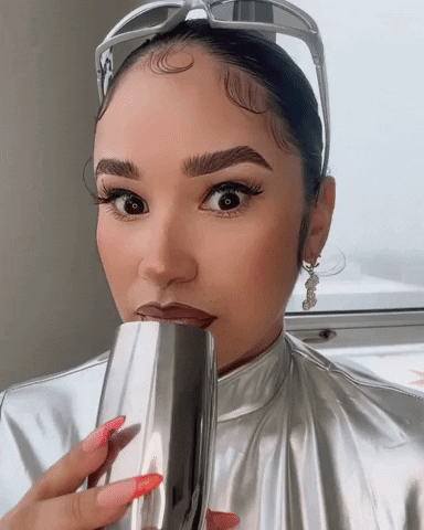 Woman Drinking With Oop Reaction GIF