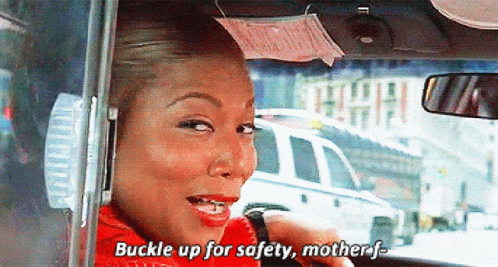 Woman Driving Car Says Buckle Up for Safety Mother F