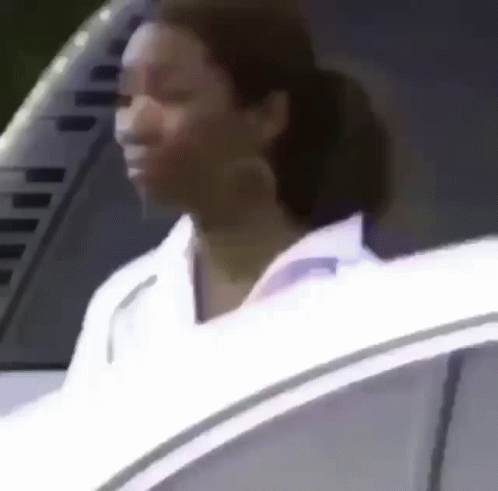Woman Driving Car With Eyes Closed