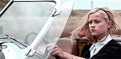Woman Driving Car With Wind Blowing Hair GIF