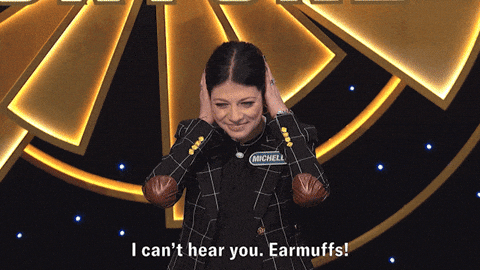 Woman Ear Plugs In Show GIF