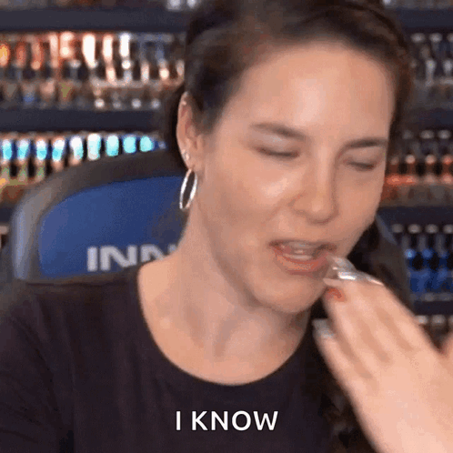 Woman Eating Candy Bar Saying I Know