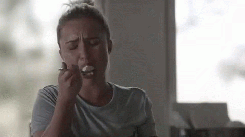 Woman Eating Ice Cream With Spoon GIF