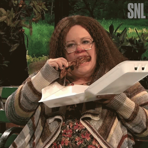 Woman Eating Meat from Styrofoam Container SNL