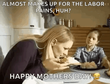 Woman Eating Sandwich At Table GIF