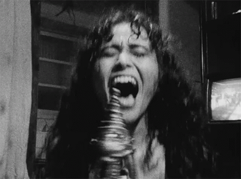Woman Eating Stack Of Coins GIF