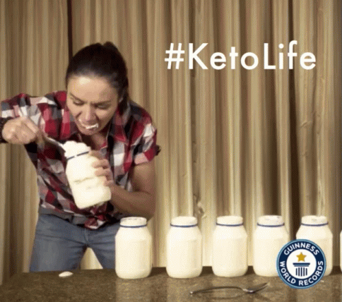Woman Eating Yogurt With Spoon #ketolife