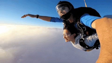 Woman Enjoying Paragliding GIF