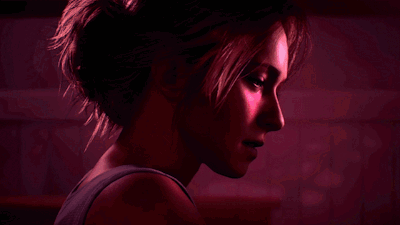Woman Face Close Up On Red Background GIF