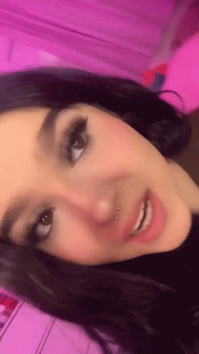 Woman Face Close Up Pink Background GIF