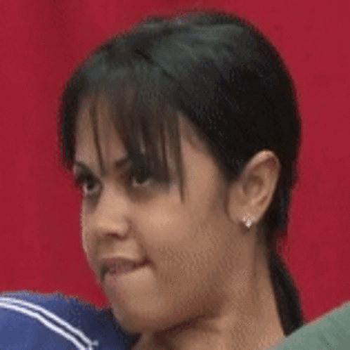 Woman Face Close Up Red Backdrop GIF