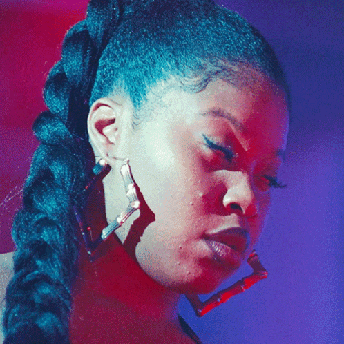 Woman Face Close Up With Earrings GIF