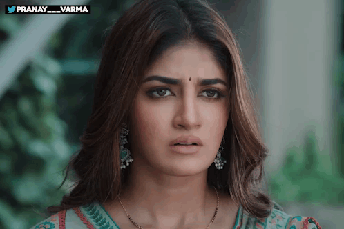 Woman Face Close Up With Pranay Varma Text