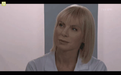 Woman Face On TV Screen With Number 12 GIF