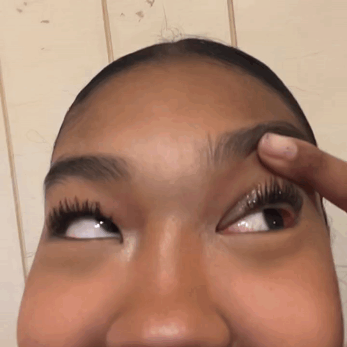 Woman Face With Hand on Eyebrows