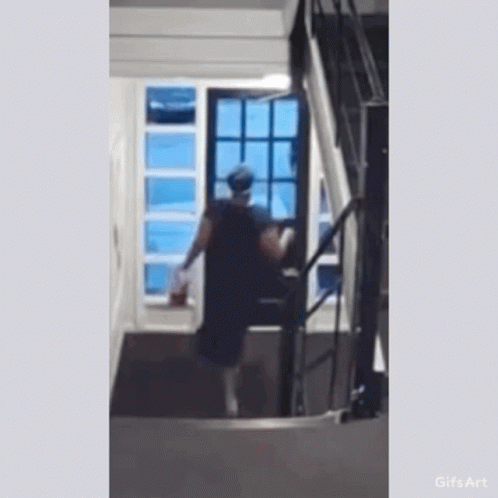 Woman Fall Out Of Stairs GIF