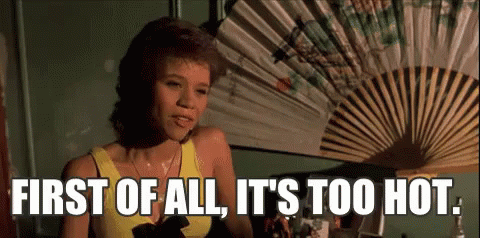 Woman Fan Saying First of All It's Too Hot