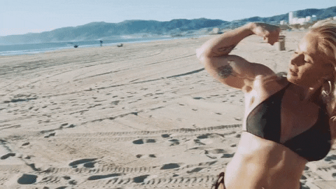 Woman Flexing Her Body Muscle Growth GIF
