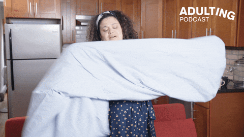 Woman Folded Bed Sheet Struggling GIF