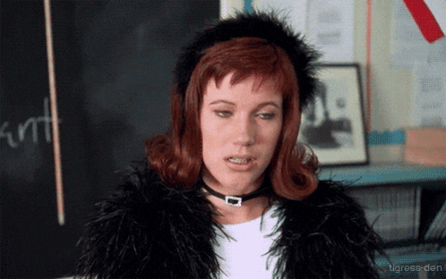 Woman Fur Coat Choker Blackboard Saying Cunt
