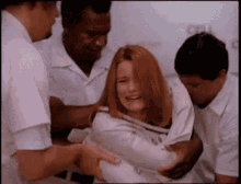 Woman Getting Dragged In Straight Jacket GIF