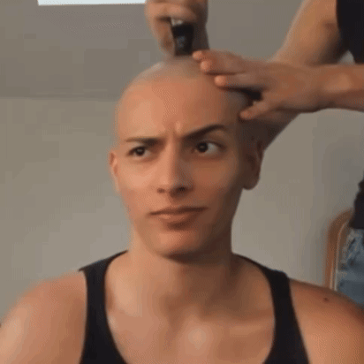 Woman Getting Head Shaved