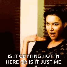 Woman Getting Hot in Here or Just Me