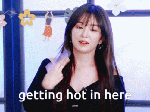 Woman Getting Hot In Here