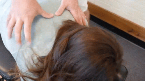 Woman Getting Massage From Doctor's Hands