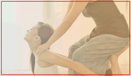 Woman Getting Thai Massage