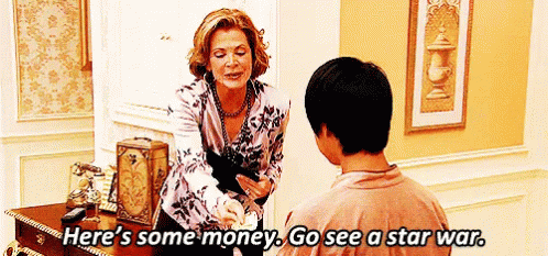 Woman Giving Money to Young Man