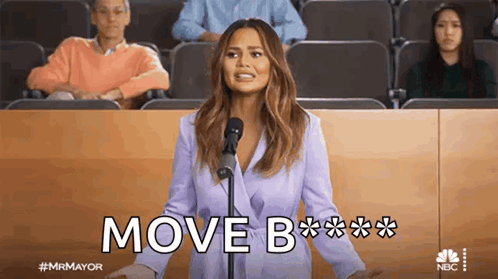 Woman Giving Speech at Microphone With Move on Screen
